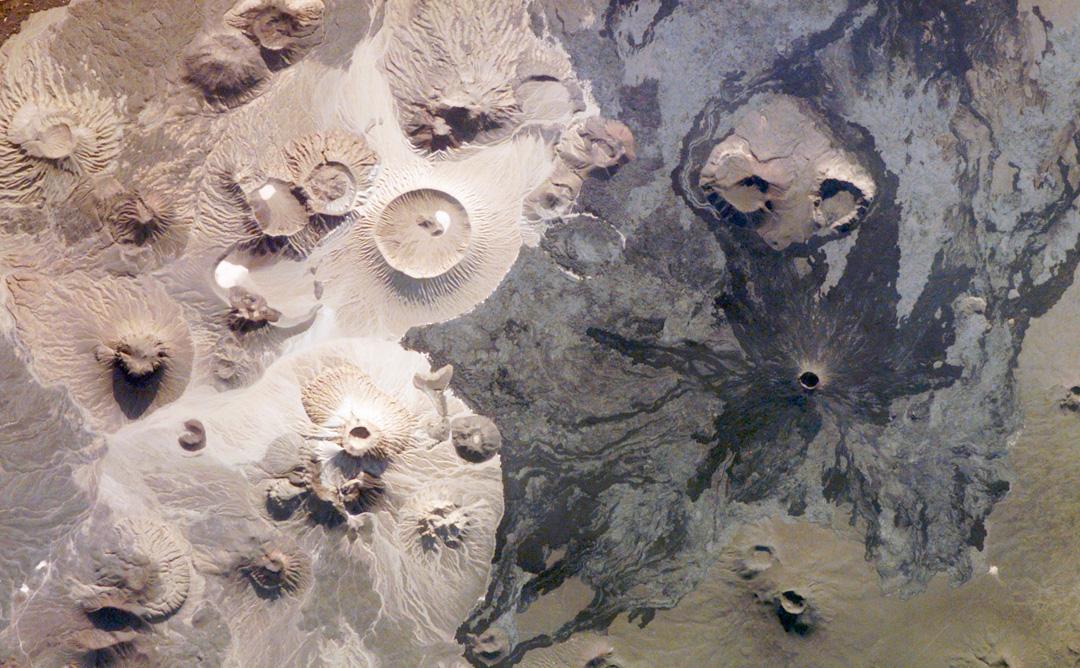 Wider view of a harrat / volcanic field landscape