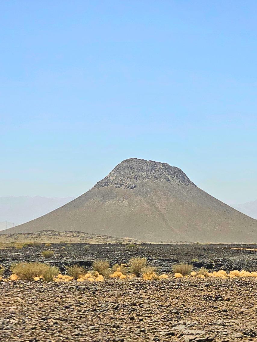 The mountain-shaped silhouette spotted from the bus window